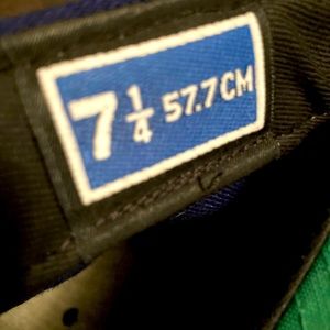 4 hats. 7 1/4 and 2 snapbacks worn